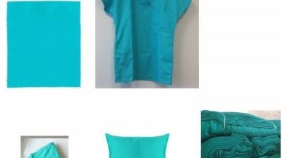 Cotton textiles dyed by photoactive reactive dyes to protect against the accumulation of organic and microbial pollutants